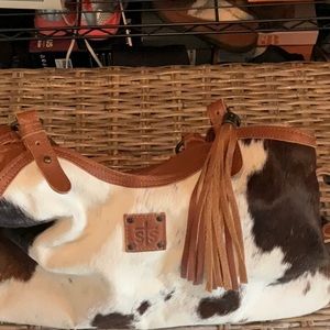 STS Rare cowhide tote. Tri color. New condition.Beautiful bag